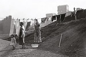 Women hanging out the washing